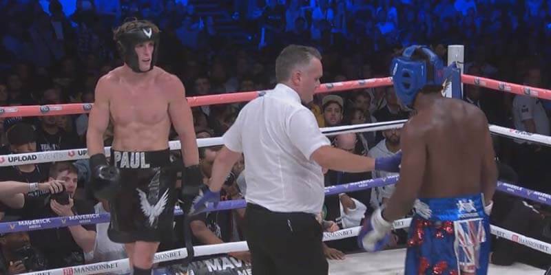 Logan and KSI in the ring with a referee in Manchester